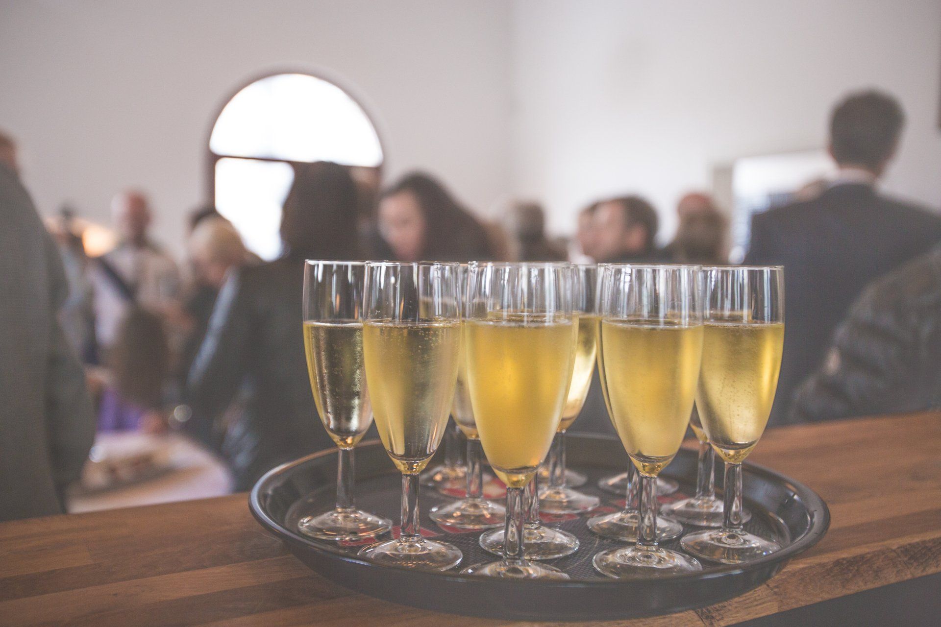 Glasses of prosecco on a tray
