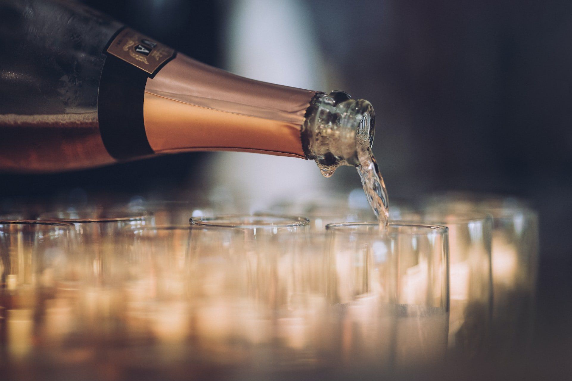 Pouring Cava in glasses